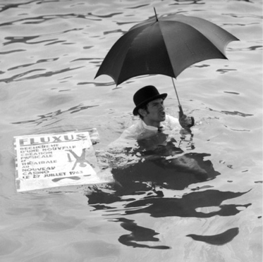 Ben Vautier bathing in the harbor of Nice, 1963